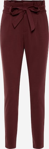 Vero Moda Curve - Pantalón plisado 'Eva' en rojo: frente