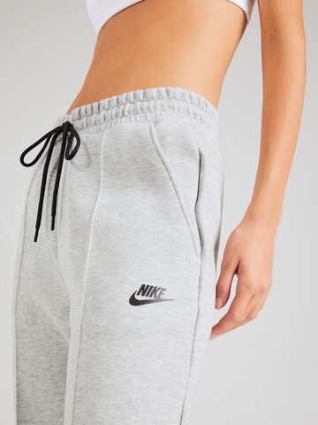 Nike Sportswear Дънки Tapered Leg Панталон в сиво