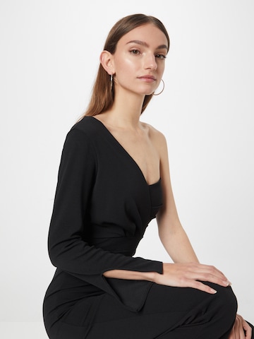 Tuta jumpsuit 'NAYELI' di TFNC in nero