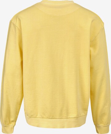 Sweat-shirt Karl Kani en jaune