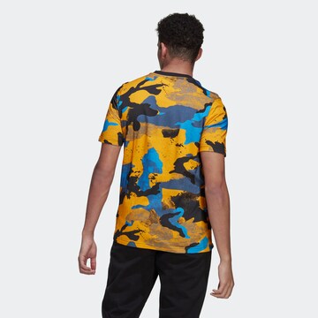 ADIDAS ORIGINALS Koszulka 'Camo Series Allover Print' w kolorze żółty