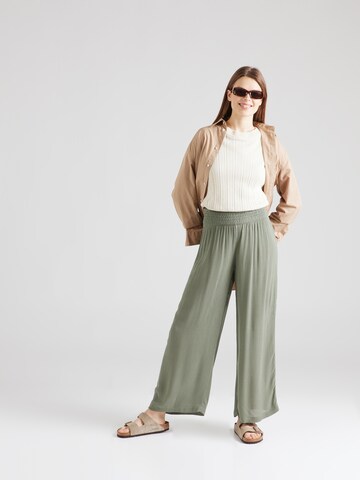 Wide leg Pantaloni 'ALONG THE BEACH' de la ROXY pe verde