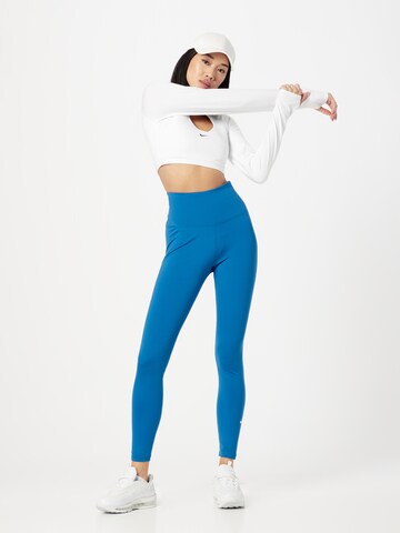 NIKE Skinny Športne hlače 'One' | modra barva