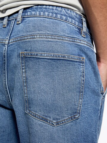 Loosefit Jeans cargo Pull&Bear en bleu