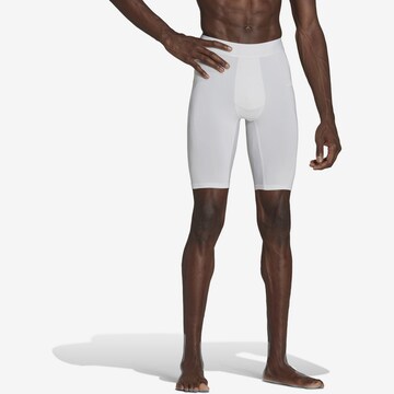 ADIDAS PERFORMANCE Skinny Workout Pants in White: front