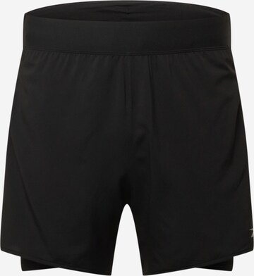 Reebok - Slimfit Pantalón deportivo en negro: frente