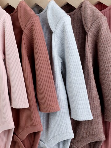 Barboteuse / body Next en mélange de couleurs