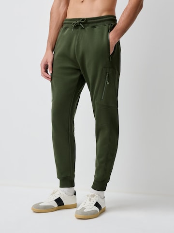 Tapered Pantaloni di Next in verde