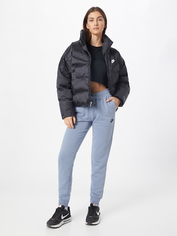 Nike Sportswear Tapered Sportbroek 'Emea' in Blauw