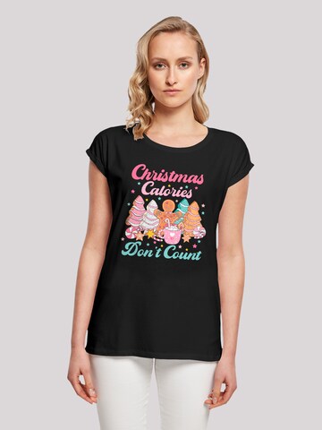 T-shirt 'Christmas Calories Dont Count Candy' F4NT4STIC en noir : devant