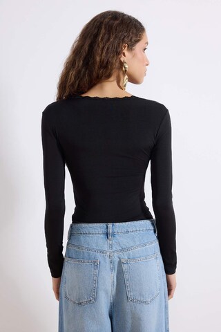 Trendyol Shirt Bodysuit in Black