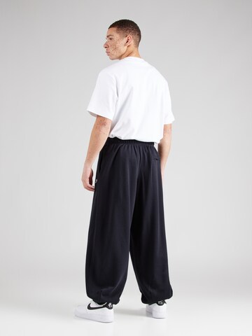 Nike Sportswear Alt kitsenev Püksid 'CLUB', värv must
