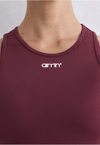 Top sportivo di Aim'n in rosso