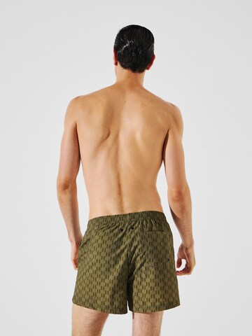 Pantaloncini da bagno di Karl Lagerfeld in verde