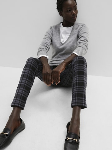 Slimfit Pantaloni di bonprix in nero