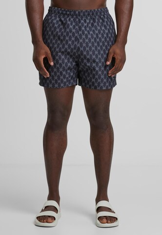 Karl Kani Plavky 'KM251-041-1 Signature Monogram Aop' - Modrá: predná strana