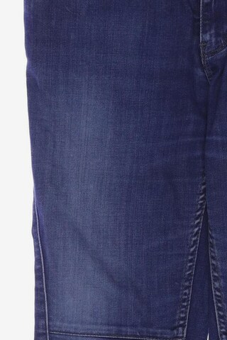 TOMMY HILFIGER Jeans in 29 in Blue