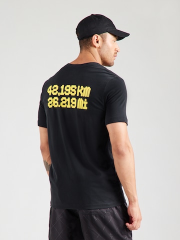 Tricou funcțional 'CITY MRTH' de la NIKE pe negru