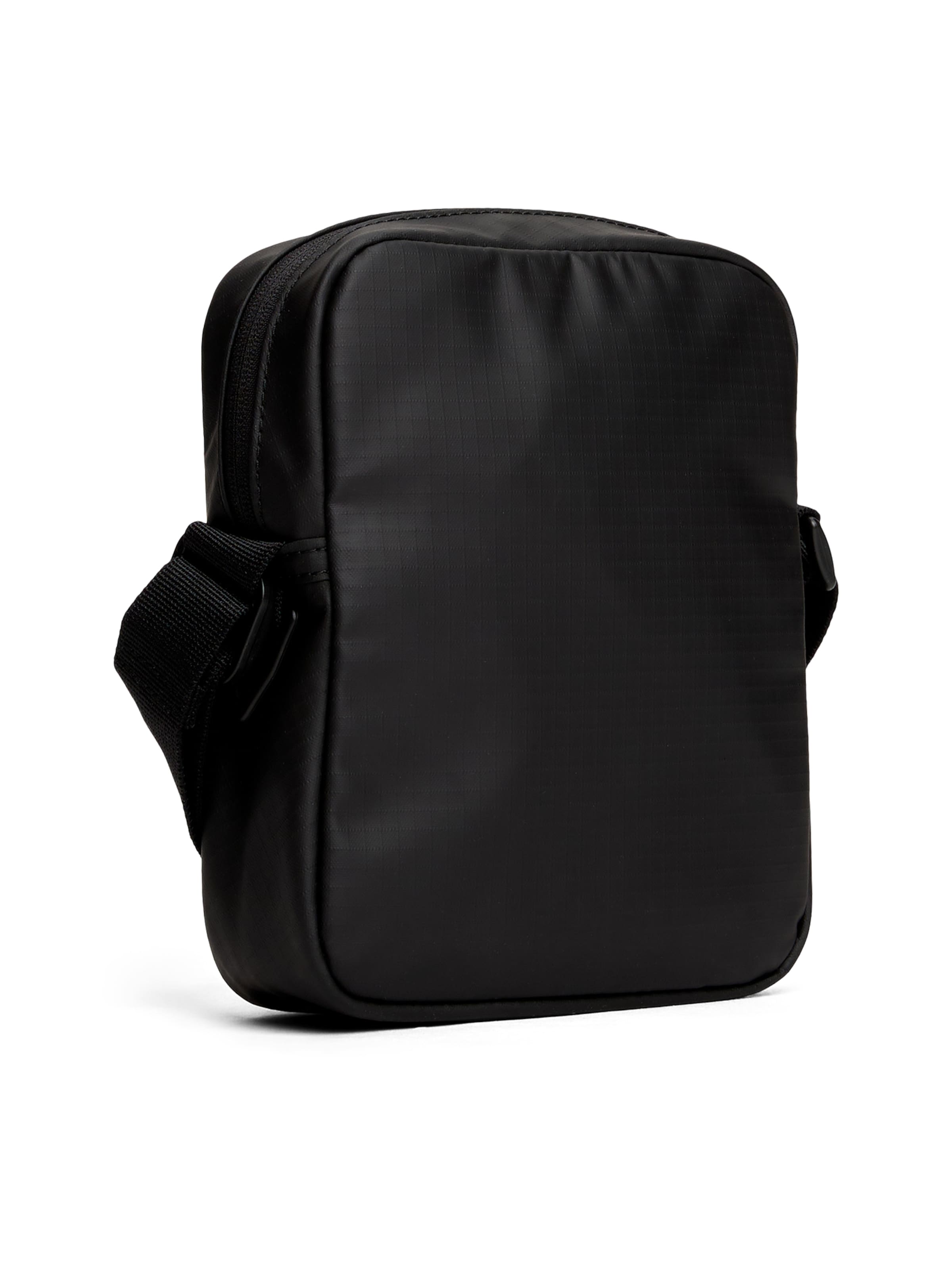 Tommy Jeans Чанта за през рамо тип преметка 'DAILY' в черно