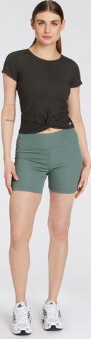 FAYN SPORTS Skinny Workout Pants in Green