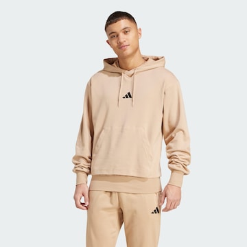 ADIDAS SPORTSWEAR Sports sweatshirt 'Essentials Feelcozy' in Brown: front