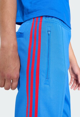 ADIDAS ORIGINALS Slimfit Sportbroek in Blauw