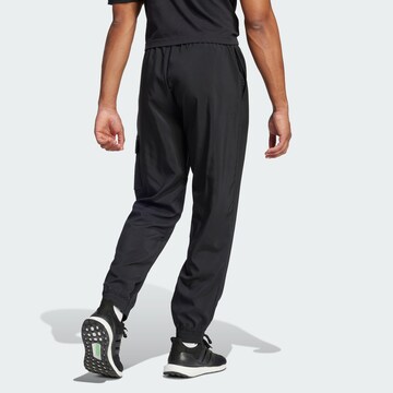 ADIDAS SPORTSWEAR Tapered Sports trousers 'Essentials' in Black