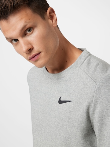 NIKE Sportovní mikina – šedá