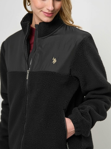 U.S. POLO ASSN. Välikausitakki ' UWLei ' värissä musta