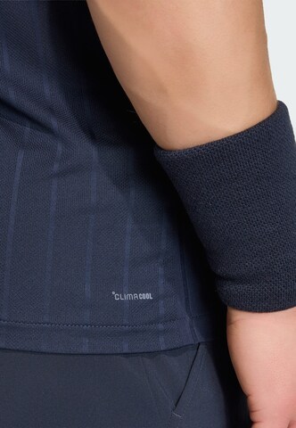 ADIDAS PERFORMANCE - Camiseta funcional en azul