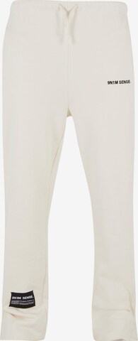 9N1M SENSE Regular Trousers in White: front