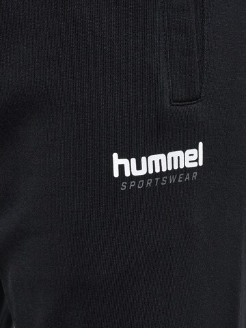 Effilé Pantalon Hummel en noir