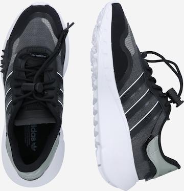 ADIDAS ORIGINALS Platform trainers in Black