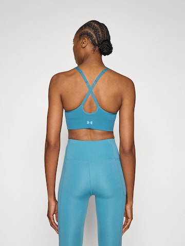 Bustier Soutien-gorge de sport 'Vanish' UNDER ARMOUR en bleu