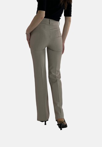 Flared Pantaloni con piega frontale di Elara in beige