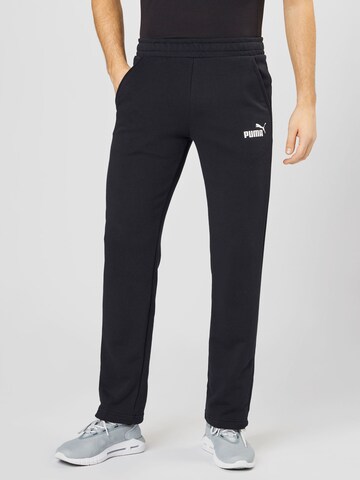 Loosefit Pantalon de sport PUMA en noir : devant