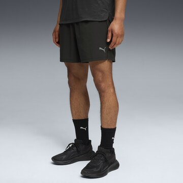 PUMA Regular Sports trousers in Black: front
