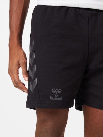 juoda Hummel Standartinis Sportinės kelnės 'Offgrid'
