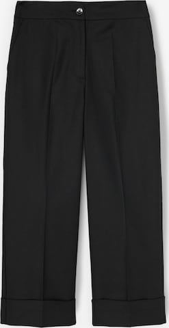 MOTIVI Pants in Black: front