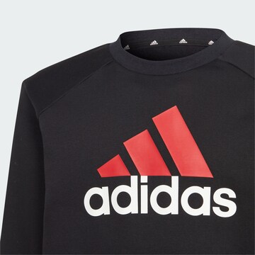 ADIDAS SPORTSWEAR Tracksuit 'Essentials' in Black