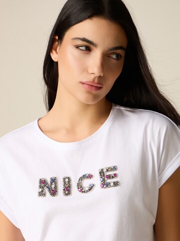T-shirt oltre en blanc