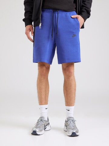 Nike Sportswear Loosefit Bukser 'Tech Fleece' i blå: forside