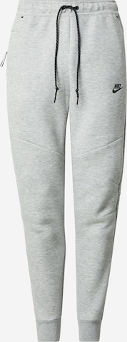 Nike Sportswear Tapered Nadrág 'TCH FLC' - szürke: elől