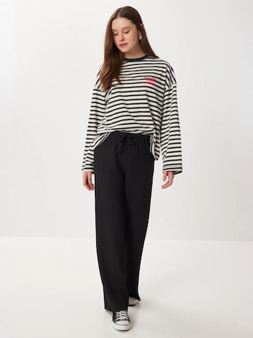 Wide leg Pantaloni di Happiness İstanbul in nero