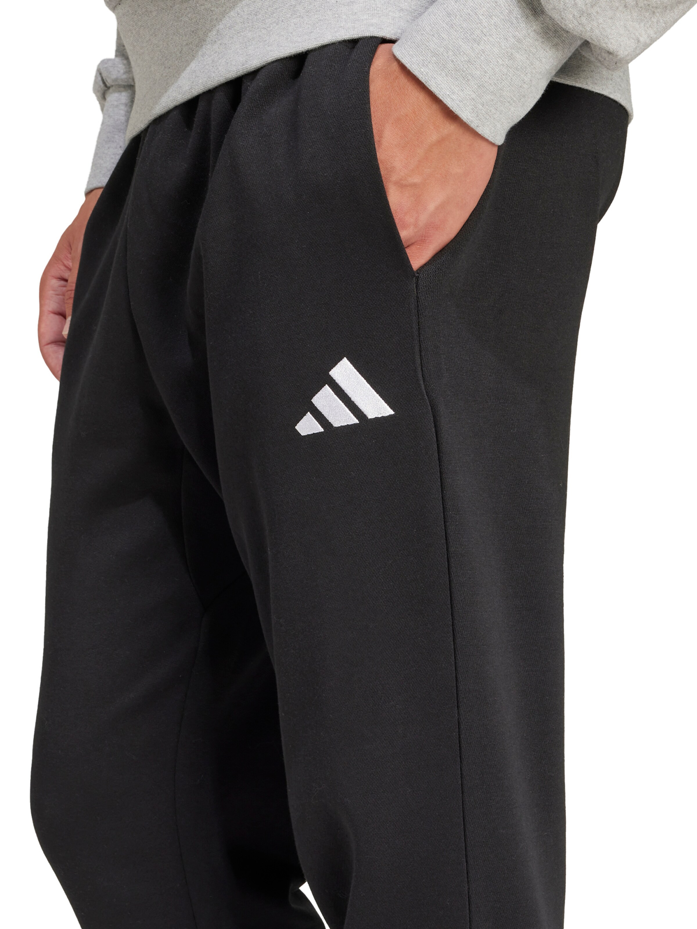 ADIDAS SPORTSWEAR Конический (Tapered) Спортивные штаны 'FEELCOZY' в Черный