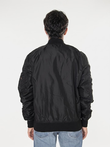 ALPHA INDUSTRIES Kurtka przejściowa 'MA-1 TT NASA' w kolorze czarny