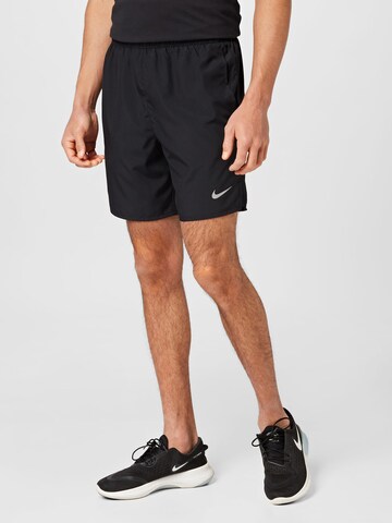 NIKE Regular Workout Pants 'Challenger' in Black: front