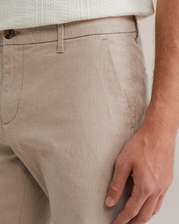 smėlio WE Fashion Standartinis „Chino“ stiliaus kelnės
