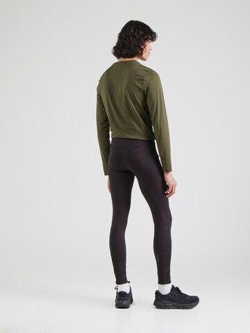 Skinny Pantaloni sportivi 'RUN FAVORITES' di PUMA in nero