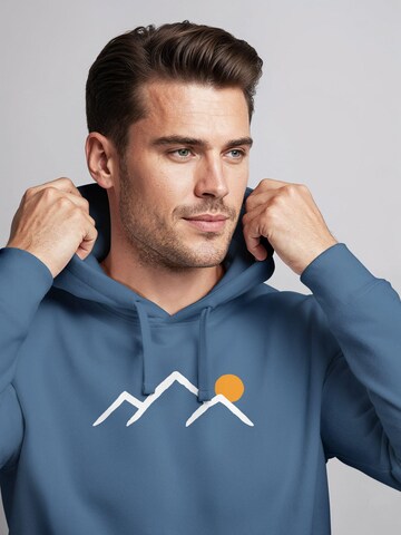 Neverless Sweatshirt 'Mountain Sun' in Blue